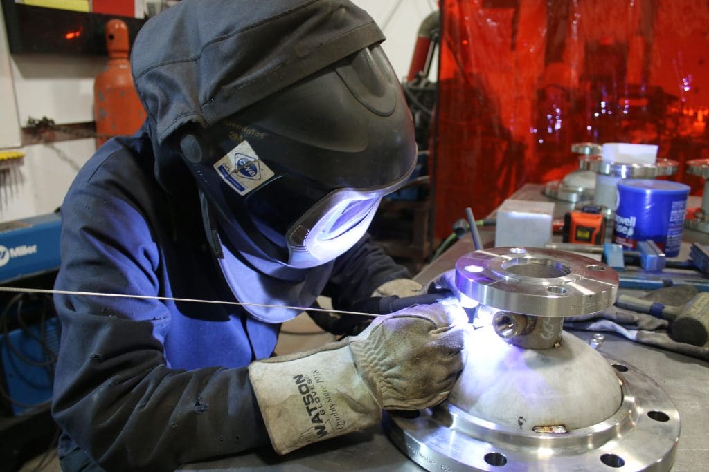 oem manufacturing welder working on industrual oem project manufacturer at Waycon Manufacturing oem solutions