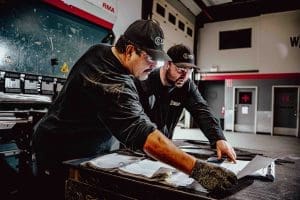 Two workers review the OEM Manufacturing paperwork
Biomass Gasification